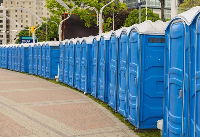 portable restrooms lined up at a marathon, ensuring runners can take a much-needed bathroom break in Cathedral City